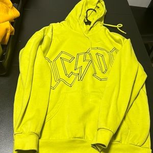 It’s a light green sweater and it’s in perfect condition